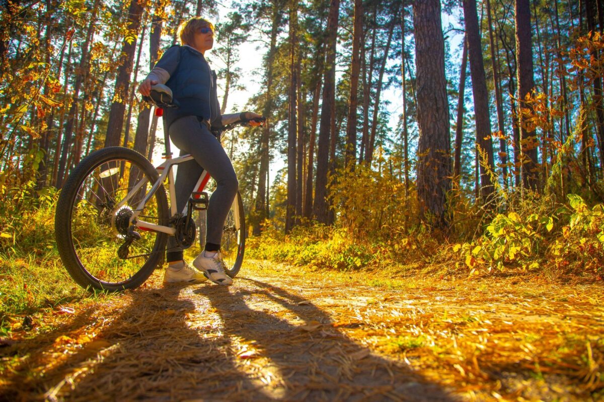 Middle aged woman mountain biking in Ruidoso, NM