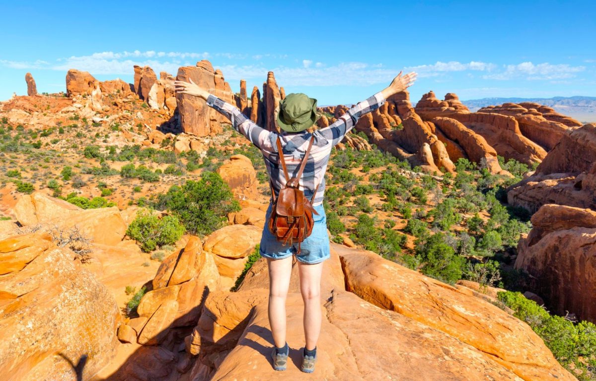 Girl hiking in red mountains